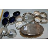 A lot comprising assorted silver salts and mustards, napkin rings and a brush etc Condition