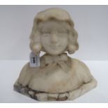 An alabaster bust of a girl in a bonnet upon onyx base, 20cm high Condition Report: Available upon
