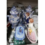 A lot comprising a pair of Delft blue and white urns, a Staffordshire figure of a couple, a Spode