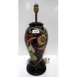 A Moorcroft Queen's Choice pattern table lamp 46cm high Condition Report: Available upon request