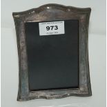 A silver-mounted photo frame, Birmingham 1986, 16.5 x 12.5cm Condition Report: Available upon