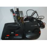 A Sega Mega Drive II and various games Condition Report: Available upon request