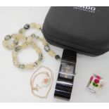 A ladies Rado Jubile, a 9ct pendant and chain, carved lucite brooch and beads Condition Report: