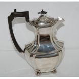 A silver hot water pot, London 1911, 23cm high, 634gms Condition Report: Available upon request