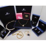 A collection of items by Swarovski to include a heart motif necklace, and other items Condition
