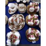 A Royal Albert Old English Rose teaset, pattern no 6241 comprising cups, saucers, plates, milk jug