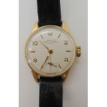 A 9ct gold ladies Favre Leuba, watch with black leather strap, weight including mechanism and