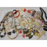 A pair of Perspex hoop earrings, faux pearls beads bangles etc Condition Report: Not available for