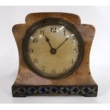 A silver plated mantle clock with enamelled panel. Condition Report: winds but not working.