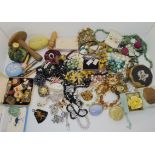 Vintage perfume, smelling salts, sewing accoutrements, a Max Neiger Pharaoh bead and costume