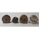 Four various reels comprising PD Malloch 2 1/2in. brass plate wind, A. Allan 2 1/2in brass/alloy