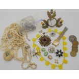 A pair of 9ct stud earrings, weight 0.9gms a yellow glass vintage bead necklace and other items