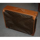 A stamped Louis Vuitton suitcase, 72cm wide Condition Report: Available upon request