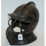 A vintage helmet with hinged visor Condition Report: Available upon request