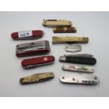 A lot comprising eleven assorted pocket knives including three Swiss Army examples Condition Report:
