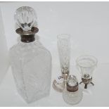 A lot comprising a decanter with silver collar, London 1906, a glass vase in silver stand,