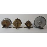 Four various reels comprising Hendryx 2in brass crank wind, another 1 1/2in, a Gow & Sons 2 1/2
