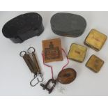 A W.J. Cummins japanned bait box, Waktins & Doncaster alloy bait box, three brass baits boxes, Hardy