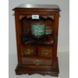 An Edwardian smokers cabinet with glazed door, 40cm high x 26cm wide Condition Report: Available