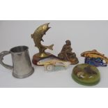 A collection of fishing related ceramics, paper weights, desk stand, place mats etc Condition