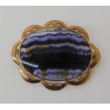 A 9ct gold brooch set with a specimen 'Blue John' hallmarked S&Co (Sydney & Co) London 1978.