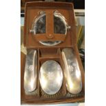 A gentleman's four piece silver vanity set in leather case, Birmingham 1926 (mirror def) Condition