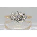 A 9ct gold diamond cluster ring, set with estimated approx 0.25cts of brilliant and eight cut