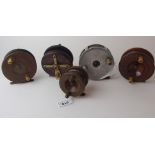 Five various reels comprising Carter & Co 2 3/4in mahogany straight back brass Nottingham style