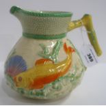 A Clarice Cliff Oceanic jug relief moulded and painted with fish, seashells and coral, printed marks