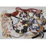 A collection of costume jewellery to include statement necklaces and diamante etc (a selection in