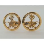 A pair of 18k Saudi Arabia symbol cufflinks, weight 14.9gms Condition Report: Available upon