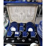 A boxed set of six Bisto china coffee cans and saucers and six silver coffeebean spoons Condition