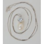 A 14k white gold pearl, aquamarine and diamond pendant, weight 2.5gms Condition Report: Available
