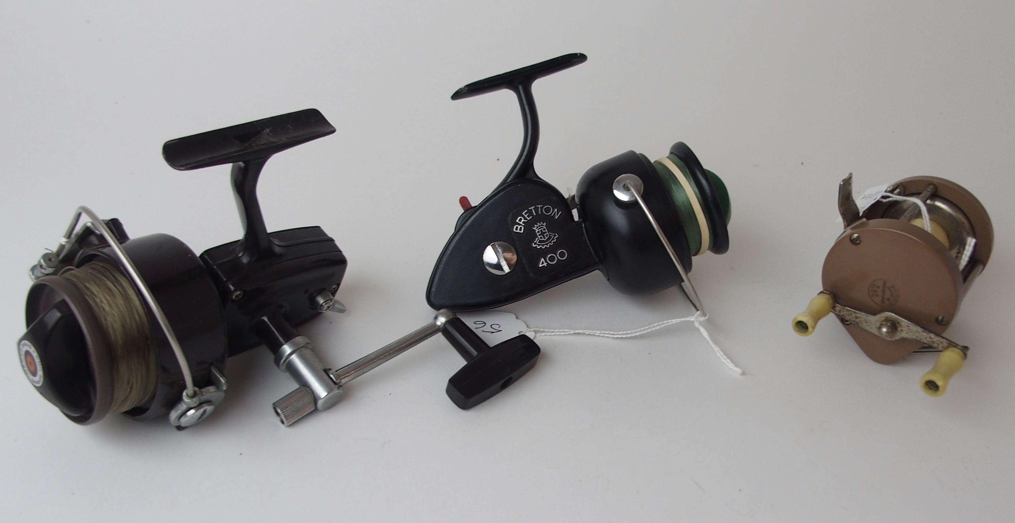 Seven various spinning reels comprising Silent Spin Flyte, Bretton 400, two stamped Cafaro Bros, - Image 4 of 4
