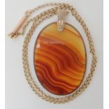 An agate specimen pendant with yellow metal bail, and vintage chain 44cm, weight 17.7gms Condition