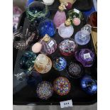 A lot comprising a Colin Heaney iridescent paperweight, millefiori paperweights, a Wedgwood glass