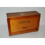 A vintage First Aid box with fall flap, 34cm wide Condition Report: Available upon request