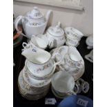 A Staffordshire Mayfair pattern tea and coffee service comprising tea and coffee pot, tea cups,
