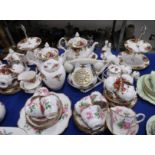 A Royal Albert Old Country Roses six setting teaset, together with two cake stands, two teapots