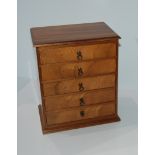 A tray lot including fiver drawer collectors cabinet, 26cm high, AA badge etc Condition Report:
