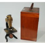 A lacquered brass microscope by E Leitz, Wetzlar, No.143698 in original case Condition Report: