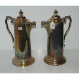 A pair of EPNS ale jugs, 38cm high Condition Report: Available upon request