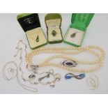 Three items of silver New Zealand jade jewellery, a silver and enamel brooch and other items