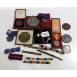 A lot comprising a Prince Albert Royal Commission bronze medallion, Coronation medals, a cased