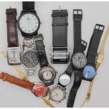 A collection of vintage watches to include, A red dialed Roamer, three Swatch watches, a Butler &