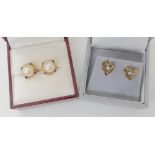 A pair of 9ct gold pearl and sapphire earrings, together with a pair of 9ct diamond accent heart