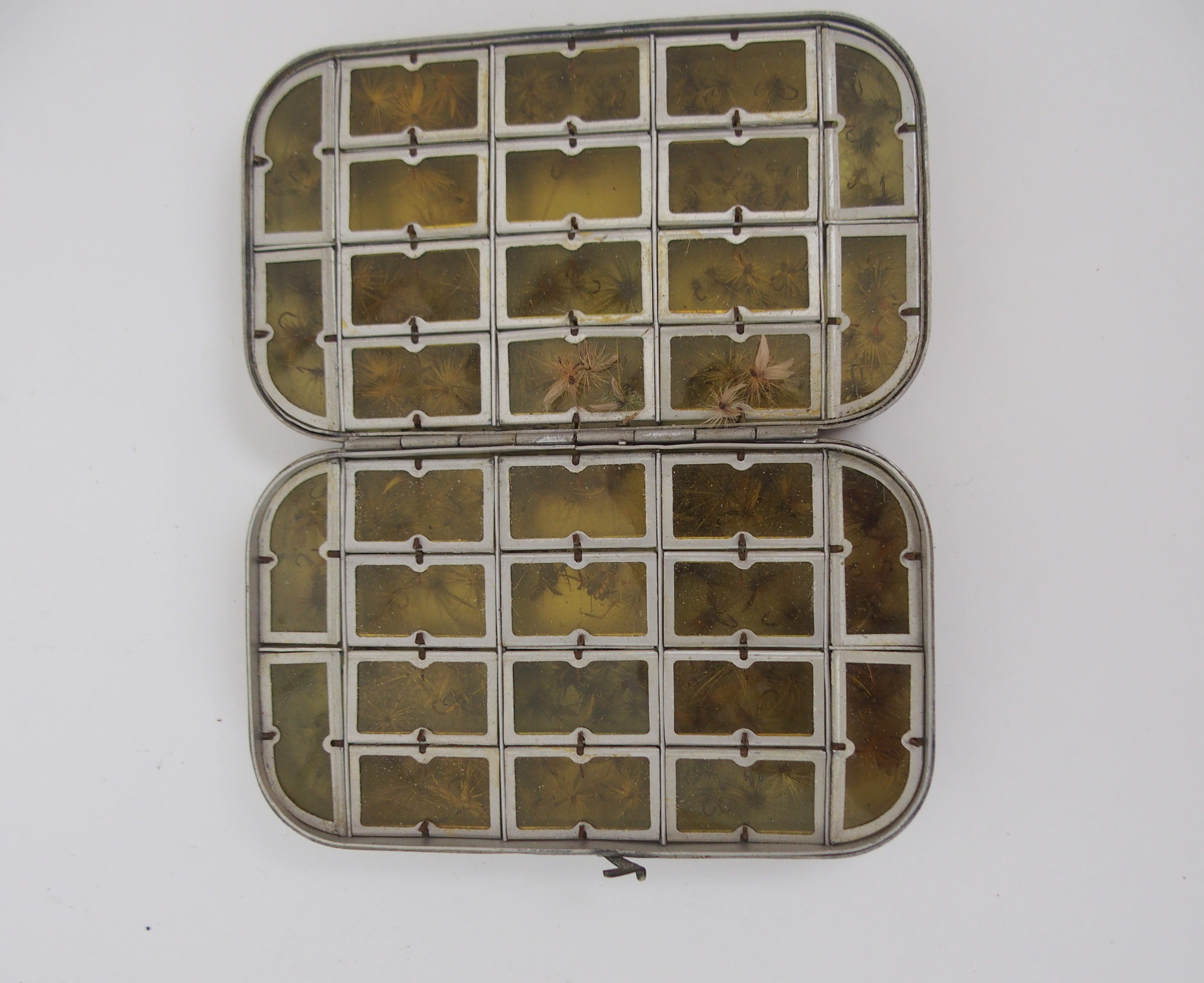 A Wheatley alloy fly case with spring loaded compartments with trout flies, Malloch's Patent - Image 2 of 6