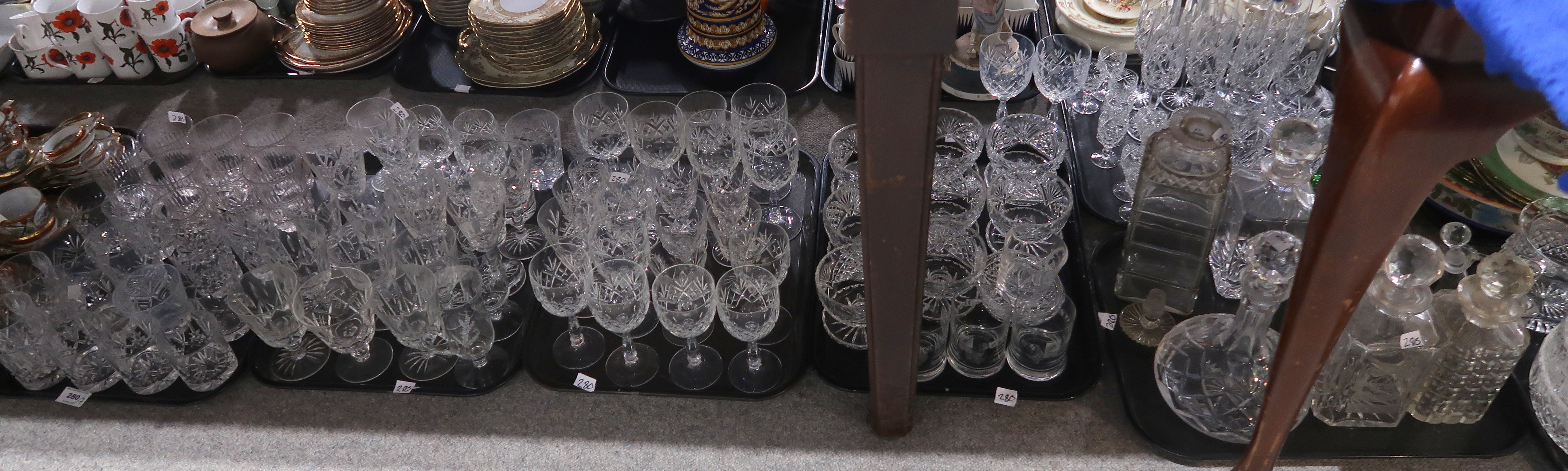 A lot comprising a large selection of cut and press moulded glass, including drinking glasses,