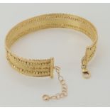 A 9ct gold Italian made bangle, weight 10.8gms Condition Report: Available upon request