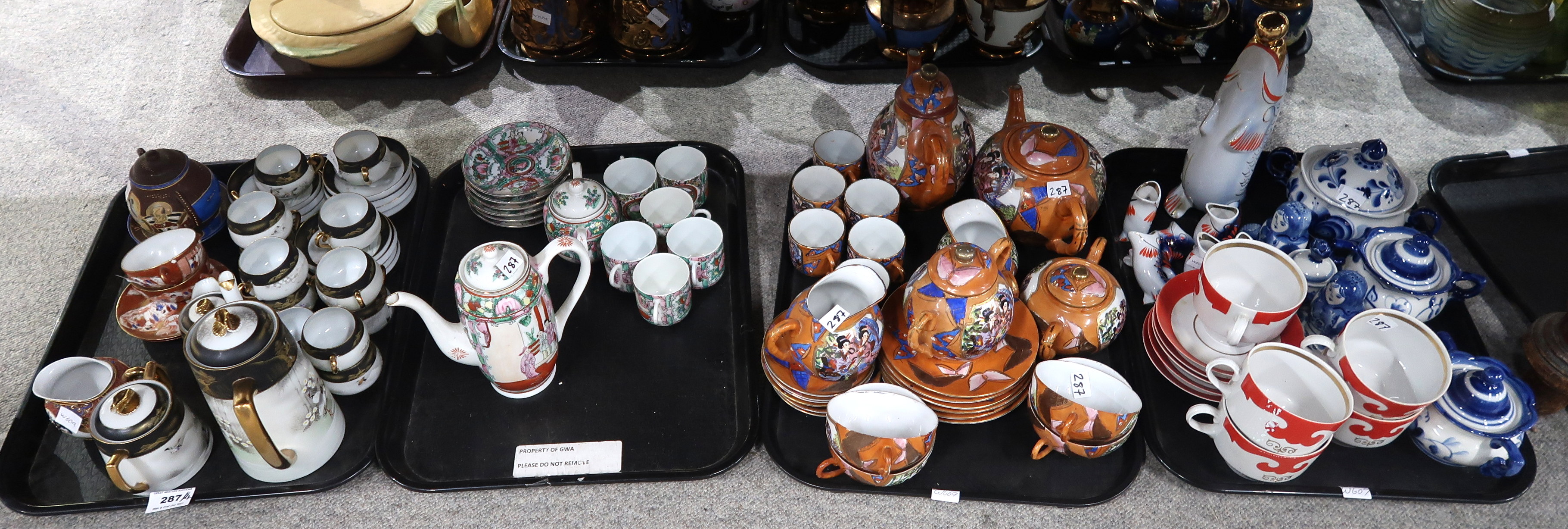 A Japanese eggshell teaset, another Satsuma hand painted tea and coffee service, a chinese coffee